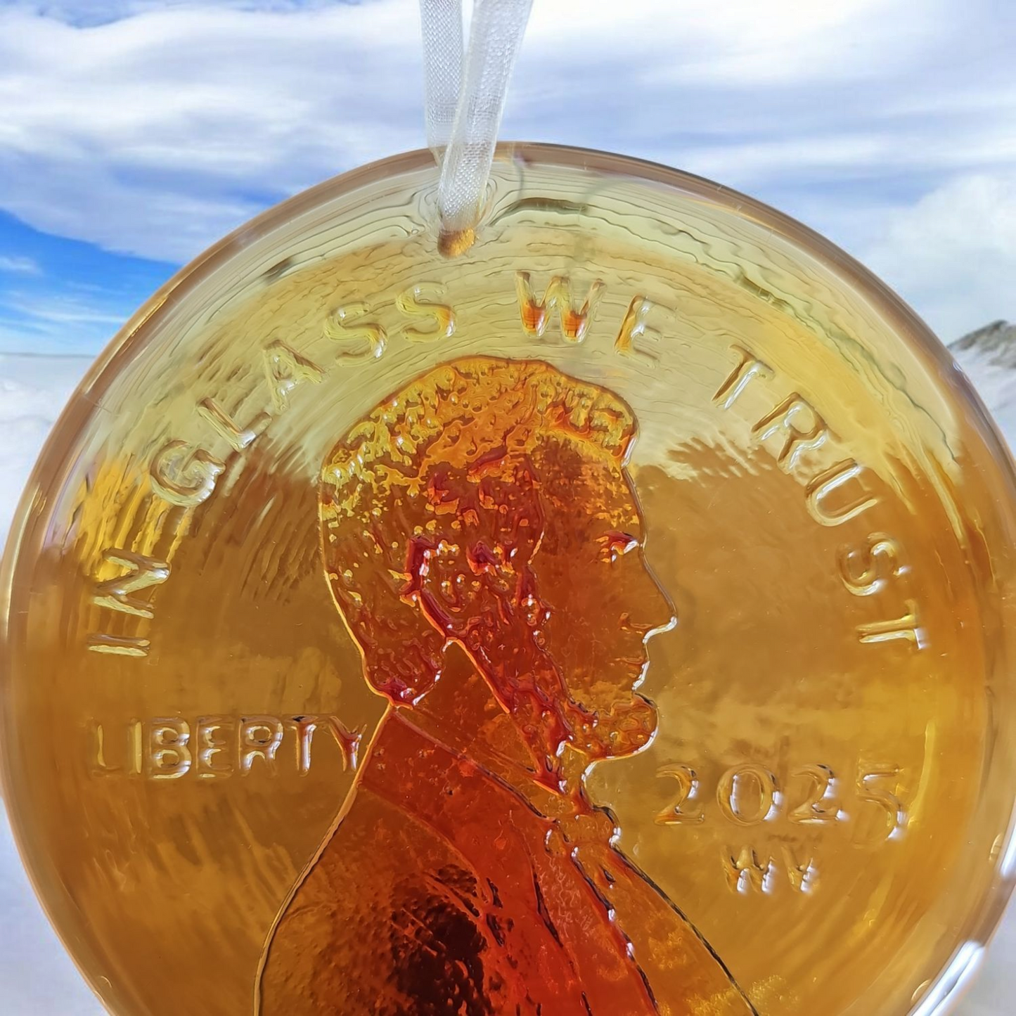 1 Blenko Heads Penny Suncatcher