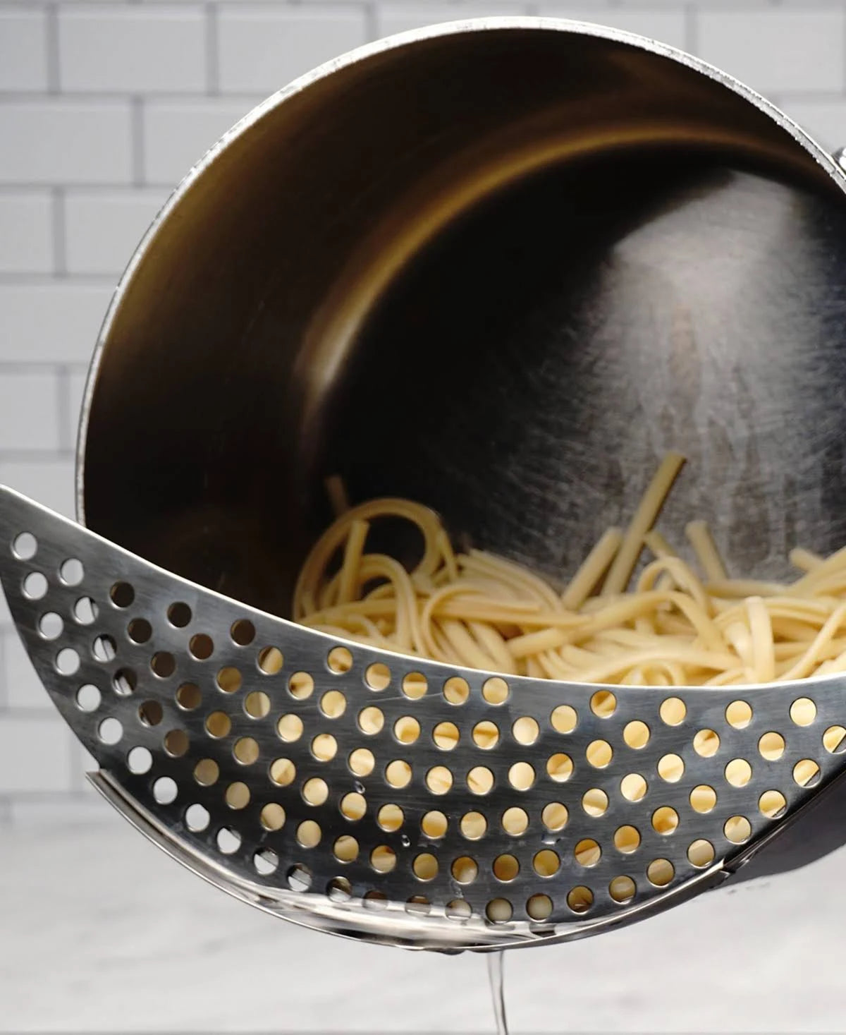 Crescent strainer
